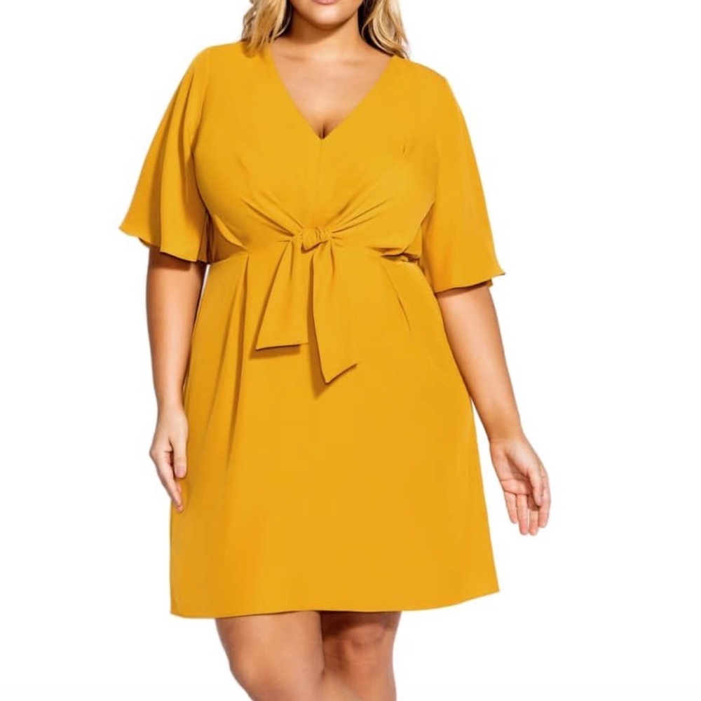 Gold City Chic tie front dress with plunging neckline